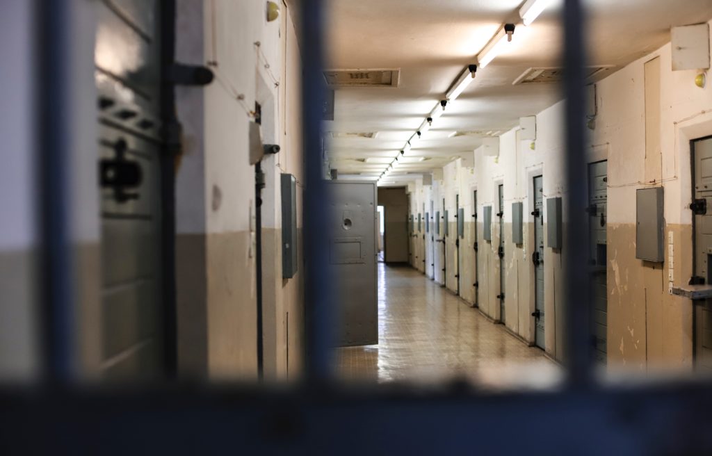 Long jail cell hallway.