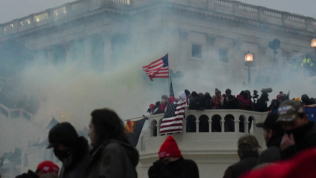 Crowd of Trump supporters marching on the US Capitol on 6 January 2021, ultimately leading the building being breached and several deaths.