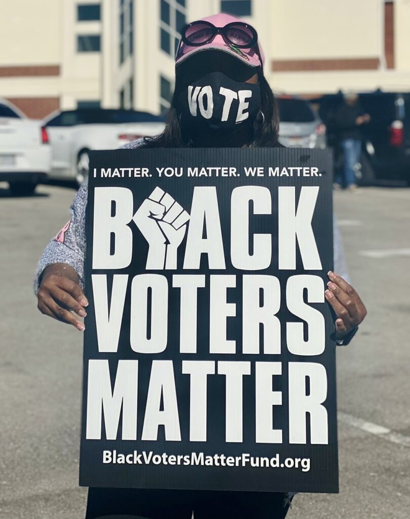 Terri_Sewell_holding_Black_Voters_Matter_sign_on_Election_Day_2020