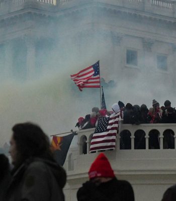 Crowd of Trump supporters marching on the US Capitol on 6 January 2021, ultimately leading the building being breached and several deaths.